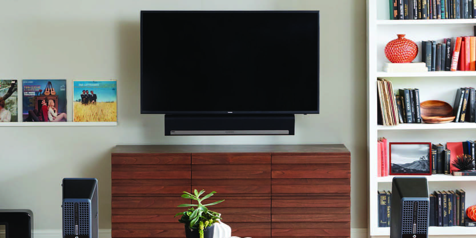 Black SA405 Soundbar Mount displayed in a lifestyle image of living room